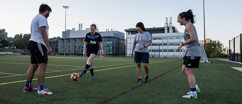 Students playing soccer