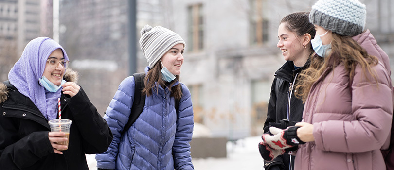 Four students talking 