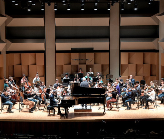 Pollack music hall with musicians on stage