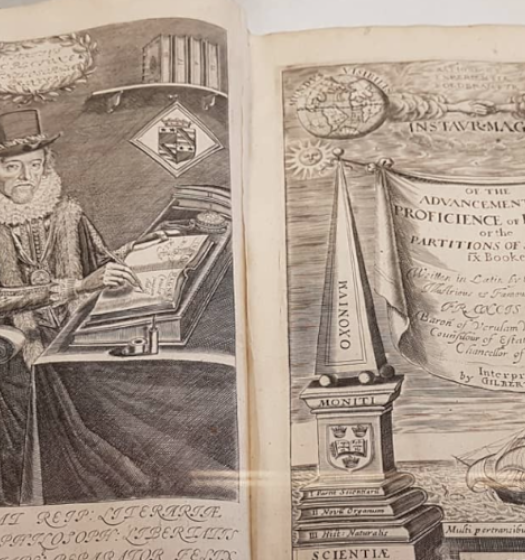 Un vieux livre avec l'image d'une personne et d'un bateau.